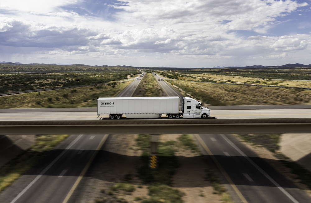 TuSimple self-driving truck on bridge photo