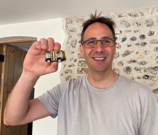 Cars of the Future editor Neil Kennet with his Matchbox self-driving bus