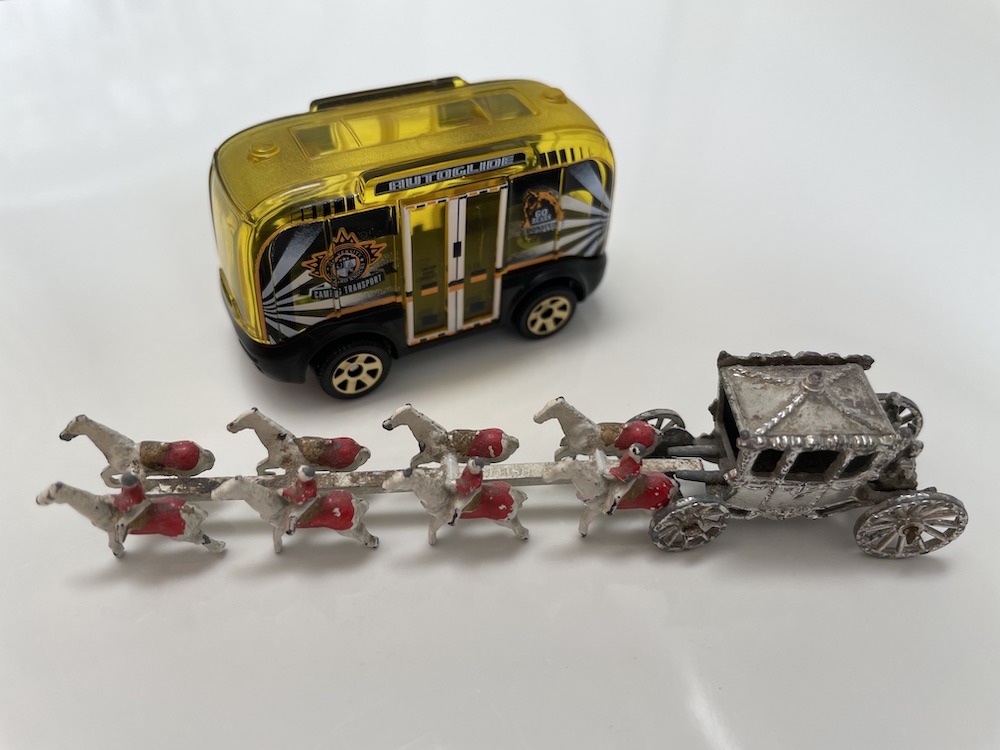 Matchbox self-driving bus and 1953 Coronation Coach