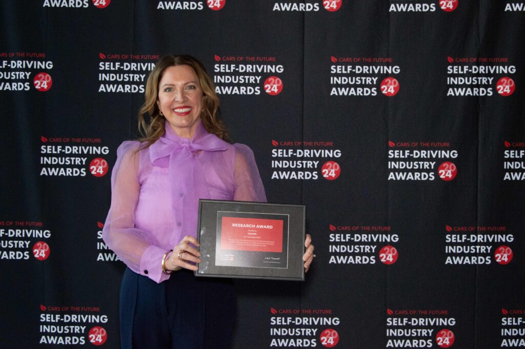 Dr Clare Mutzenich receiving our 2024 Self-Driving Industry Award for Research
