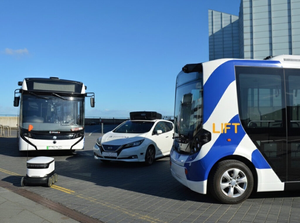 Self-driving award-winners 2025: Enviro100AEV bus, evolvAD Nissan LEAF, Ohmio LIFT shuttle, and Starship robot.