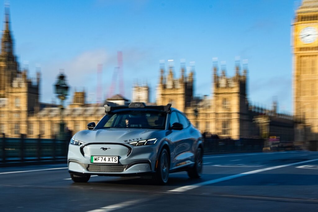 A Wayve self-driving car, with a safety driver, on Westminster Bridge in London
