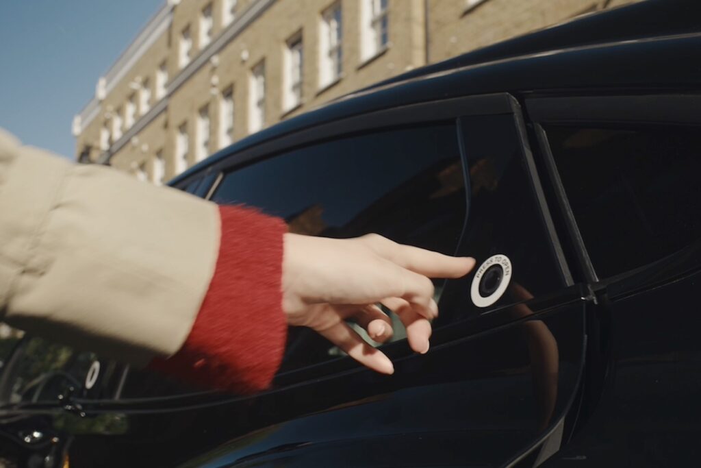 Wayve and Uber press to open rear door button